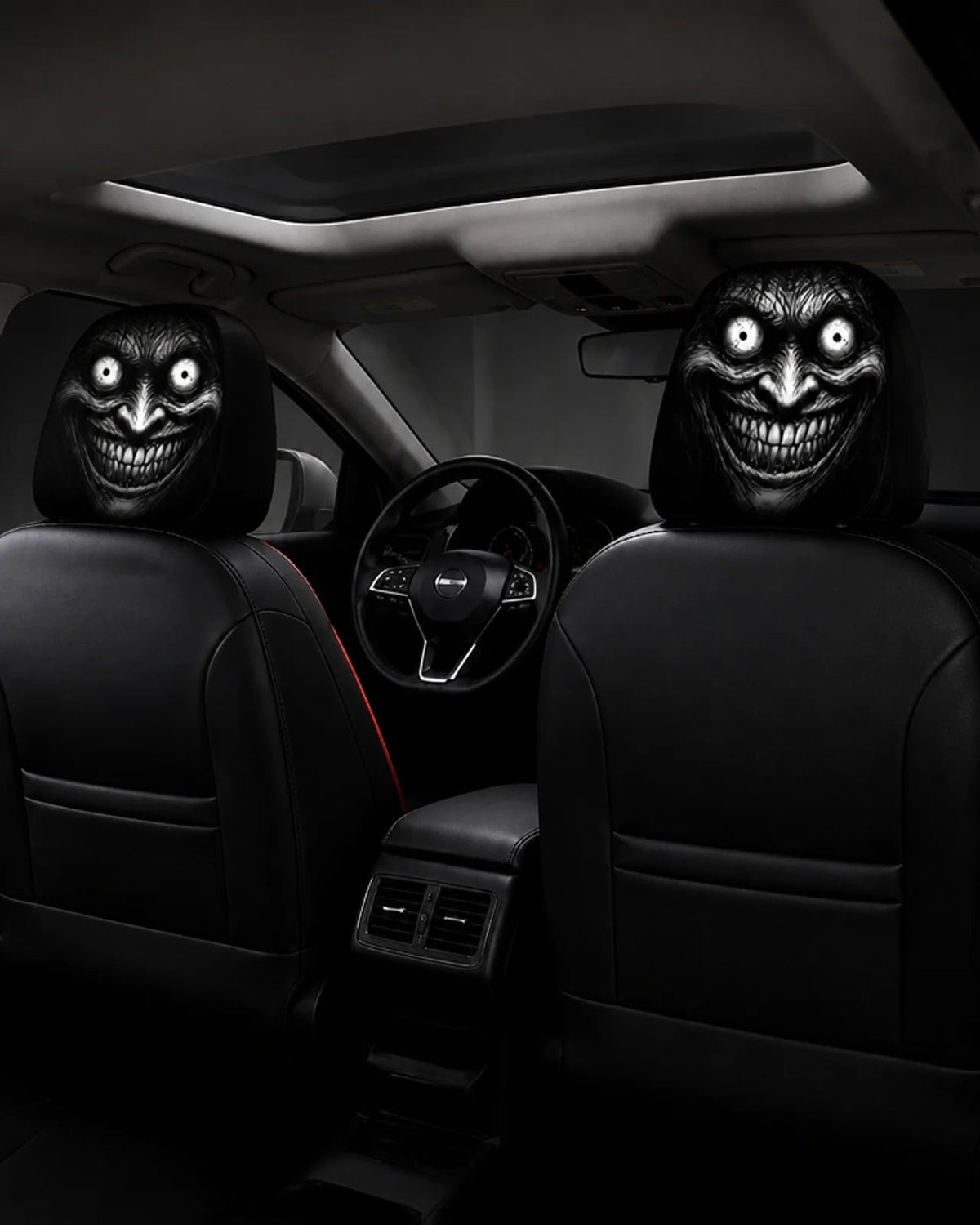 GhostRideGrin creepy grin headrest cover in a car